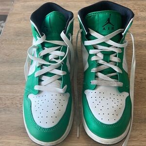 Green and white Jordan’s